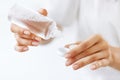 Woman Hands Putting Liquid From Bottle To Lens Box