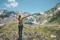 Woman hands raised enjoying landscape mountains and lake Travel Lifestyle adventure Royalty Free Stock Photo