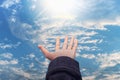 Woman hands reach out to the sky like praying in front of sky Royalty Free Stock Photo