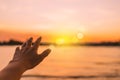 Woman hands reach out to the sky like praying in front of sky Royalty Free Stock Photo