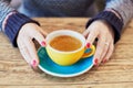 Woman hands with red manicure and cup of coffee Royalty Free Stock Photo