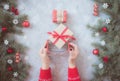 Christmas gray grunge background, fir twigs, berries, snowflakes, baubles, top view. Royalty Free Stock Photo