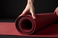 Woman hands rolling yoga mat. Generate Ai