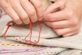 Woman hands sewing with muline Royalty Free Stock Photo