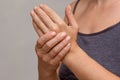 Woman hands showing numb hand