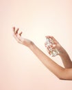 Woman hands spraying perfume Royalty Free Stock Photo