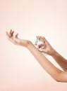 Woman hands spraying perfume Royalty Free Stock Photo