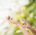 Woman hands spraying perfume Royalty Free Stock Photo