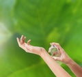 Woman hands spraying perfume