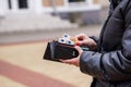 Woman hands taking money out of black leather purse Royalty Free Stock Photo