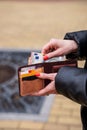 Woman hands taking money out of leather wallet Royalty Free Stock Photo