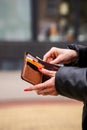 Woman hands taking money out of leather wallet Royalty Free Stock Photo