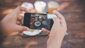 Woman Hands Taking Photographs Foods on Her Mobile Phone, Customer Woman Using Smartphone Take a Picture Food for Sharing Her Royalty Free Stock Photo