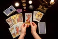 Woman hands with Tarot cards