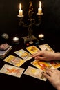 Woman hands with Tarot cards