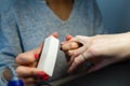 Woman hands to manicure in nail beauty salon filing close-up selective focus. Royalty Free Stock Photo