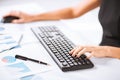 Woman hands typing on keyboard