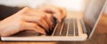 Woman hands typing on laptop keyboard at business meeting Royalty Free Stock Photo