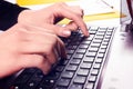 Woman hands typing on laptop keyboard Royalty Free Stock Photo