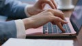 Woman hands typing laptop keyboard at office workplace close up. Worker writing Royalty Free Stock Photo