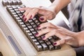 Woman hands typing on old computer keyboard Royalty Free Stock Photo