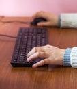 Woman hands typing on personal computer pc keyboard.