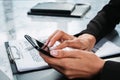 Woman hands typing on the smartphone, closeup office table Royalty Free Stock Photo