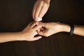 Woman hands using cotton wool, close-up Royalty Free Stock Photo