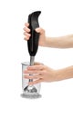 Woman hands using hand blender. Isolated on white Royalty Free Stock Photo