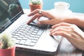 Woman hands using laptop computer, Workspace, Working at home