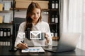 Woman hands using Laptop, tablet typing on keyboard and surfing the internet with email icon, email marketing concept, send e-mail Royalty Free Stock Photo