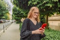 Woman hands using mobile phone. Close up of women's hands holding cell telephone copy space screen Royalty Free Stock Photo