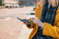 Woman hands using mobile phone. Close up of women& x27;s hands holding cell telephone copy space screen Royalty Free Stock Photo