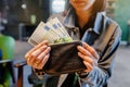 woman hands with wallet and euro banknote money in cafe Royalty Free Stock Photo