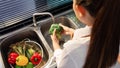 Woman hands washing Vegetables for Preparation of vegan salad on the worktop near to sink in a modern kitchen, Homemade healthy Royalty Free Stock Photo