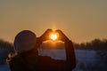 Woman hands in winter gloves. Heart symbol shaped, lifestyle and Royalty Free Stock Photo