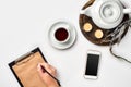 A woman hands writing on empty book note, diary, spread mockup, top view, studio. Cup of coffee break. Royalty Free Stock Photo