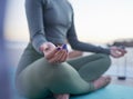 Woman, hands and yoga in meditation for zen, spiritual wellness or calm exercise on the beach. Hand of female yogi