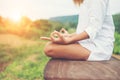 Woman hands yoga meditations and making a zen symbol with her ha