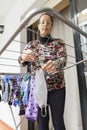 Woman hanging a homemade mask