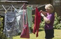 Woman hanging washing out to dry Royalty Free Stock Photo