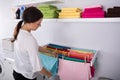 Woman Hanging Wet Clothes In Laundry Room Royalty Free Stock Photo