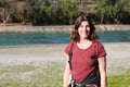 Woman happy middle aged cute smiling walking lake river sea side