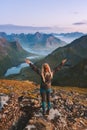 Woman happy raised hands on mountain top adventure hiking healthy lifestyle Royalty Free Stock Photo