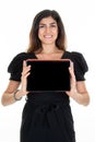 Woman happy smiling showing blank mock up black tablet computer empty screen on white background Royalty Free Stock Photo