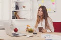 Woman has healthy business lunch in modern office interior Royalty Free Stock Photo