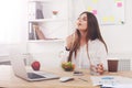 Woman has healthy business lunch in modern office interior Royalty Free Stock Photo