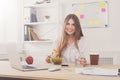 Woman has healthy business lunch in modern office interior Royalty Free Stock Photo