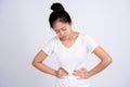 Woman has stomach pain on white background