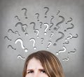 Woman has too many questions Royalty Free Stock Photo